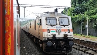 Indias Longest Running 12431 TVC NZM Rajdhani Express Xing With 10103 Mandovi At Sangmeshwar Road [upl. by Yennej897]