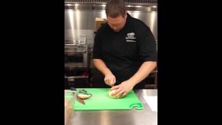 How to cut a bloomin onion Handcut onion demo from the Outback Kitchen [upl. by Edmead641]