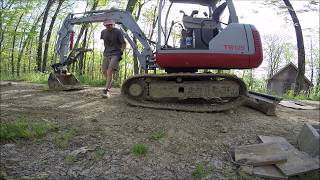 How to installTakeuchi track tensioning cylinder [upl. by Crescantia]