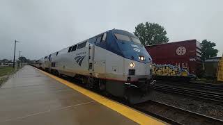 a westbound manifest entering Elkhart yard as Amtrak 49 moves up for passengers [upl. by Lashonda]