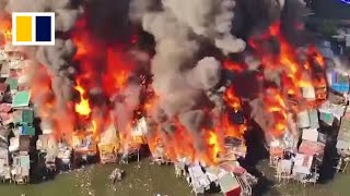 Fire engulfs hundreds of shanty houses in Manila [upl. by Arev]