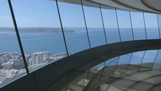 Seattles Space Needle Opens Revolving Glass Floor 500 Feet in the Air [upl. by Ahsinek]