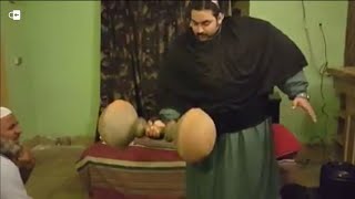 See the power of khan baba and100 kg dumbell [upl. by Eilegna]