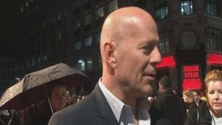 Bruce Willis hits red carpet for new Die Hard movie [upl. by Asiulana626]