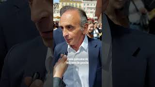 Eric Zemmour frappe une femme qui vient de lui jeter un œuf sur un marché en Corse [upl. by Grady]