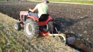 Case 448 Garden Tractor pulling a 10quot Brinly Moldboard plow [upl. by Edmee]