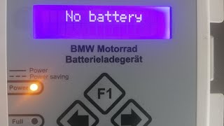 How to use BMW Motorrad battery charger to charge your bmw R1200gs adventure [upl. by Solakcin]