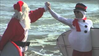 RAW Surfing Santas take over Cocoa Beach FL [upl. by Airtemak]