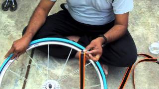 How to Install Mr Tuffy liner in a Road Bike Tire [upl. by Blanc395]