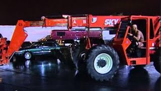 quotStone Coldquot Steve Austin traps Triple H in his car and drops him with a forklift Survivor Series [upl. by Argyres]