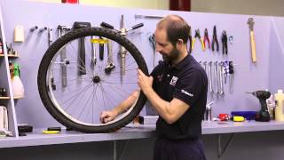 How To Fix A Flat Tyre  Fix A Road Bike Puncture [upl. by Ecinej857]