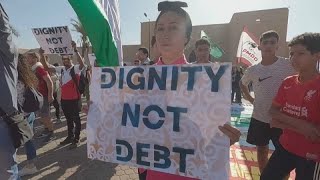 Activists protest on sidelines of IMF and World Bank annual meeting [upl. by Sothena271]