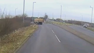 Dramatic dash cam footage shows moment car flips over roundabout [upl. by Enialehs928]