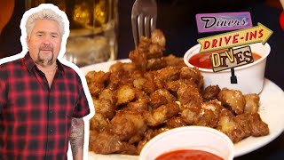 Guy Fieri Eats Chicken GIZZARDS in Michigan  Diners DriveIns and Dives  Food Network [upl. by Tam]