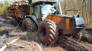 Valtra forestry tractor with big fully loaded trailer [upl. by Etnomed]