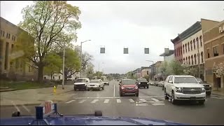 Dashcam Police chase shooting suspect against oneway traffic through downtown Kalamazoo FULL [upl. by Sirk]