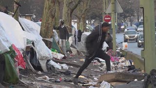 Thousands of asylum seekers waiting in streets makeshift camps around Paris [upl. by Anaihs]