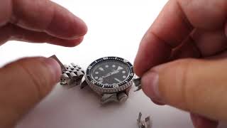 How to adjust a Seiko jubilee bracelet [upl. by Mcclain]