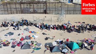 Drone Captures Scenes Of Migrants Amassing At USMexico Border [upl. by Nnyltiac647]