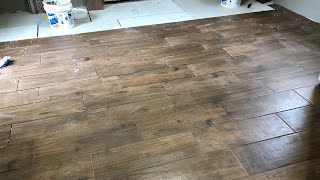 Installing a TILE FLOOR  Wood Look Tile Installation  Part 2 [upl. by Ernaline]