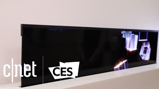 LG Display makes a 65inch TV that actually rolls up [upl. by Nnylaf279]