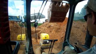 Excavators Backfilling and Compacting Pipe [upl. by Katharine765]