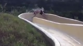 Man flies off waterslide onto rocky cliff [upl. by Nomae333]