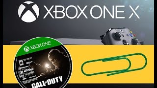 Xbox One X  Get Your Stuck Disc Out  Manual Eject [upl. by Hermon]