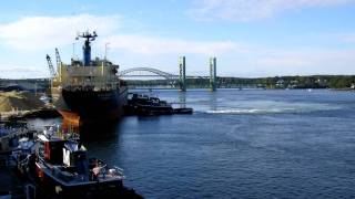 Tugboats move a large ship in Portsmouth Harbor [upl. by Areivax248]