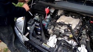 How to change the battery in a Buick Rendezvous [upl. by Socin]