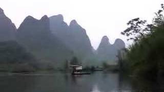 Bamboo rafting  Li River Yangshuo GuiLin China 阳朔竹筏漂流 [upl. by Mickelson]