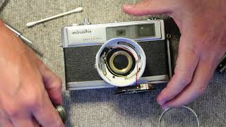 How to fix a stuck shutter on a Minolta HiMatic Camera [upl. by Kcirb]