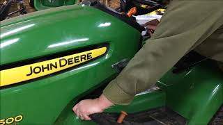 Changing the belt on a John Deere X350 mower [upl. by Cuthbertson]