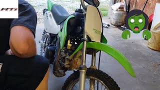 Replacing a carburetor on a Kawasaki KLX 110 [upl. by Nylessej]