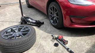 How to Change a Wheel on a Tesla Model 3 [upl. by Lenor]