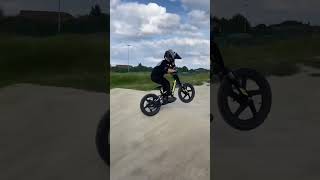 Revvi 16 vs Stacyc Electric Balance Bikes race at BMX track best E bikes for kids [upl. by Etti]