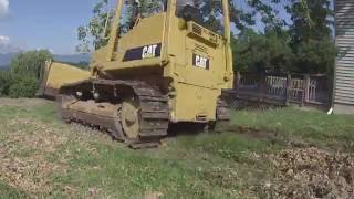 Cat d4 dozer load on trailer and push down hill [upl. by Nimaj]