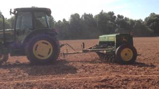 John Deere 5065M pulling JD BD1108 Grain Drill [upl. by Atnima]