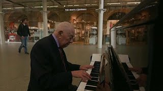 Piano player Denis 91 spreads joy at London St Pancras station [upl. by Valentino480]