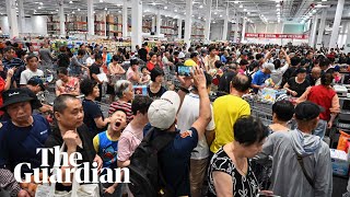 Openingday frenzy at first Costco store in China [upl. by Allenotna]