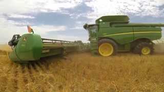 Four John Deere S680s  Wheat Harvest 2014 [upl. by Ardaid111]