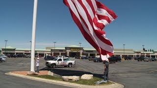 Raising a Large Flag on a Steel Crank Flagpole [upl. by Adiahs]