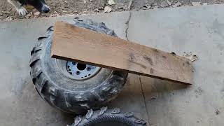 How to Mount and Install New ATV Tires Yourself [upl. by Jard252]