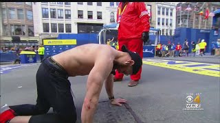 Marine Veteran Crawls Across Boston Marathon Finish Line [upl. by Bobbette]