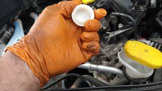 Renault scenic 16  water pumptiming beltspark plugsoil change  part 4 [upl. by Nerw494]