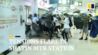 Protesters and police fight at Sha Tin MTR station after day of protests in Hong Kong [upl. by Norred976]