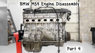 Part 4 BMW M54 Engine Disassembly Vanos Valve Cover Crank Pulley [upl. by Nueovas536]