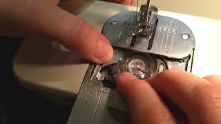 How to wind the bobbin on a Singer Creative Touch 1036 sewing machine [upl. by Subak]