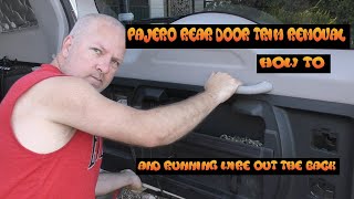 Pajero removing rear door trim and running wire to wheel carrier [upl. by Gowon]