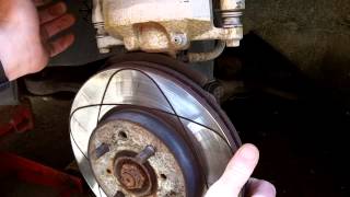 How to change front brake rotors 20012005 Honda Civic [upl. by Attennod]